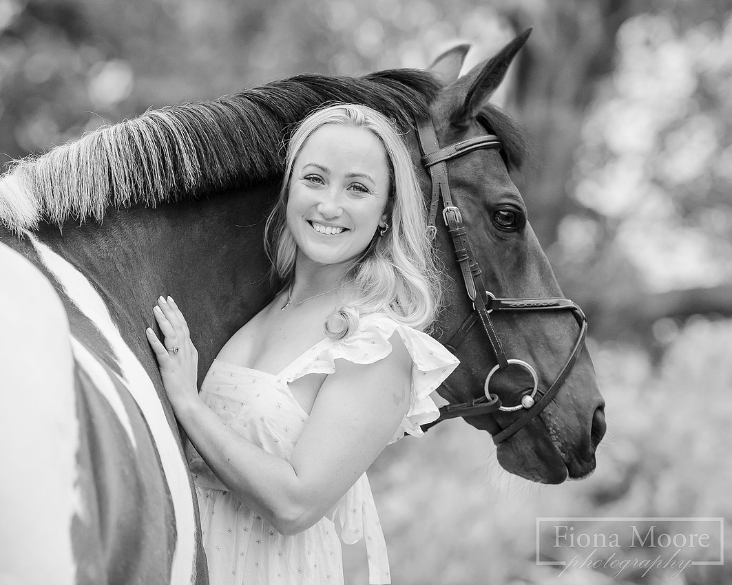 Black and white portrait of a Skewbald mare with her owner by Staffordshire based Equine Photographer. Fiona Moore Photography